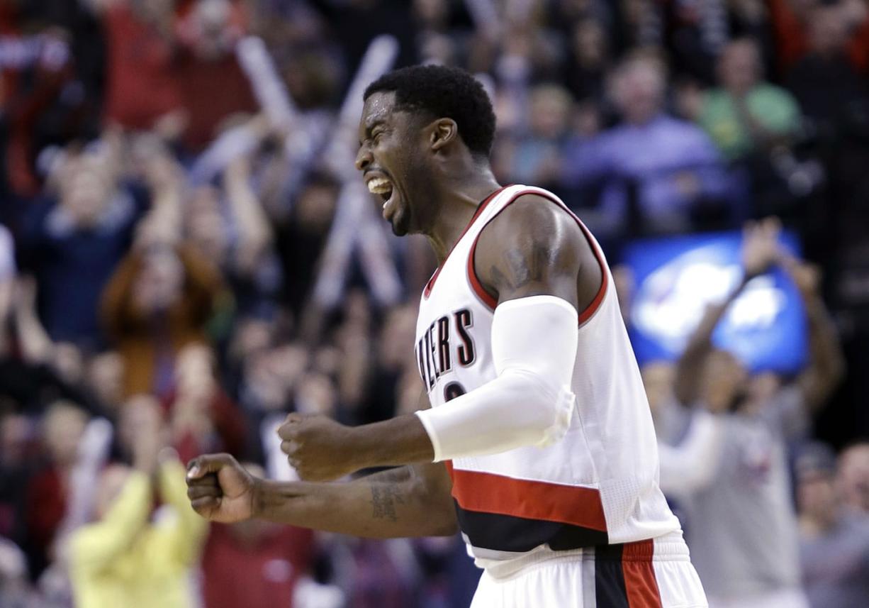 Portland Trail Blazers guard Wesley Matthews celebrates after the Blazers took the lead over the Charlotte Hornets late in the second half of an NBA basketball game in Portland, Ore., Tuesday, Nov. 11, 2014.