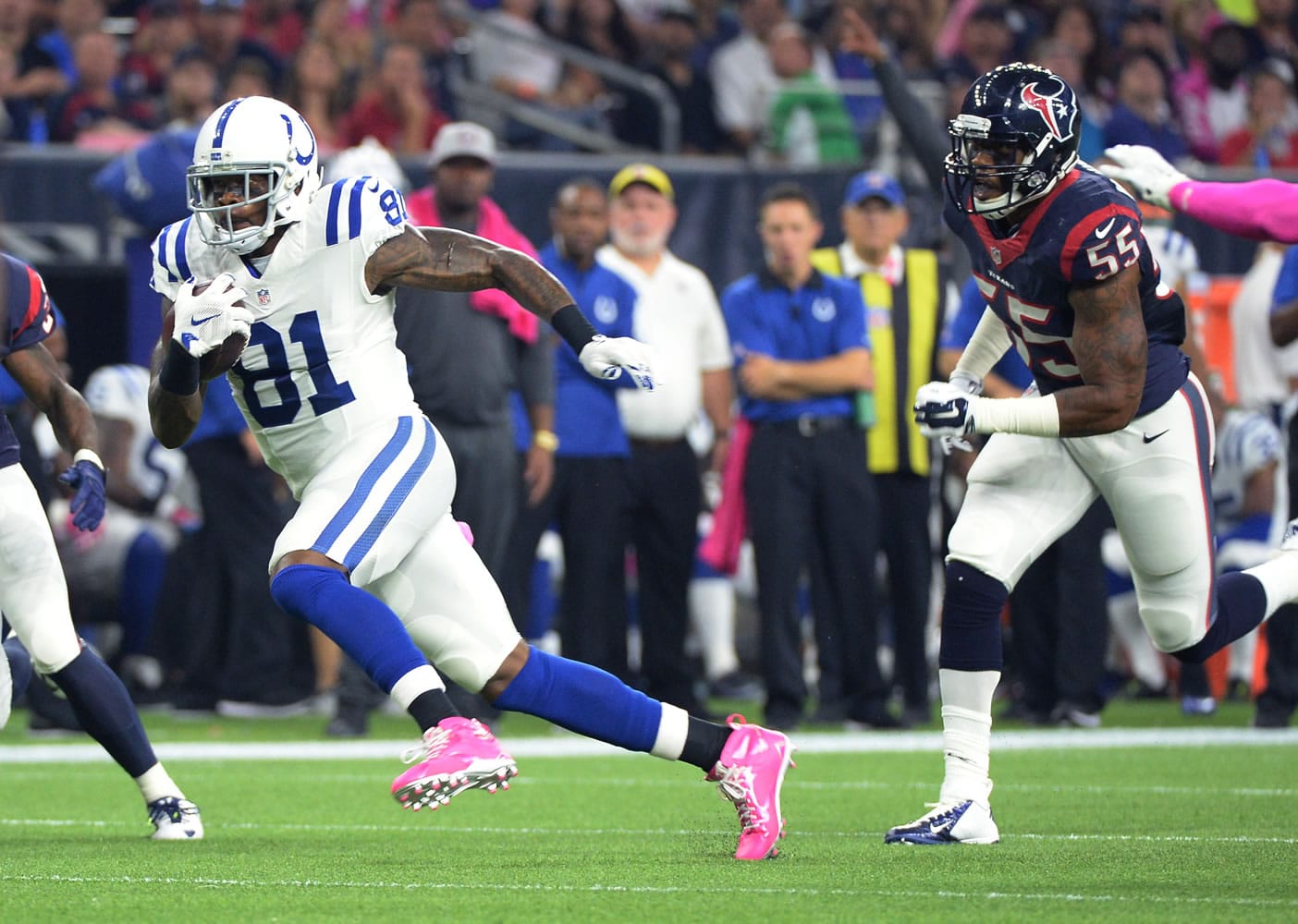 Indianapolis Colts' Andre Johnson is chased by Houston Texans' Benardrick McKinney (55) after a reception during the first half Thursday, Oct. 8, 2015, in Houston.