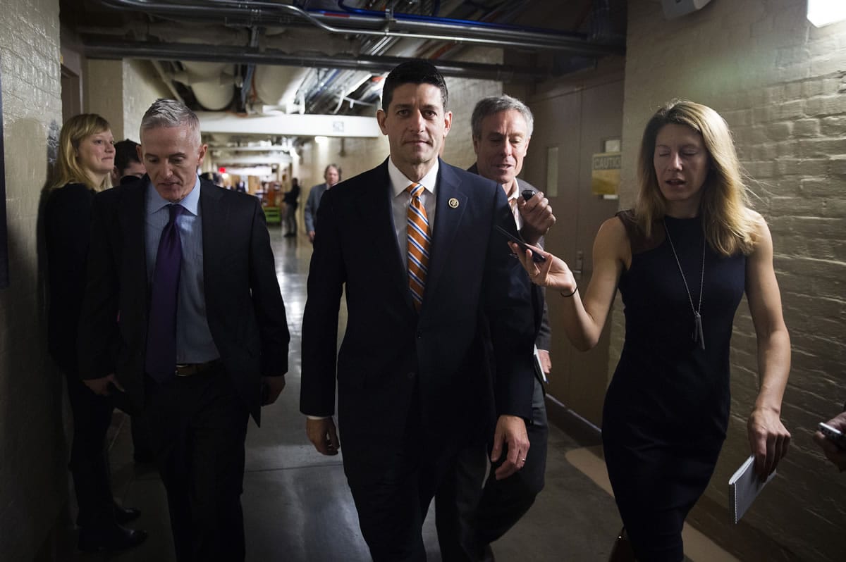 Rep. Paul Ryan, R-Wis., center, and Rep. Trey Gowdy, R-S.C., arrive  for a House GOP meeting on Capitol Hill in Washington on Friday. The pressure is on Ryan to run for House speaker in the chaotic aftermath of Majority Leader Kevin McCarthy&#039;s sudden decision to abandon his campaign for the post.