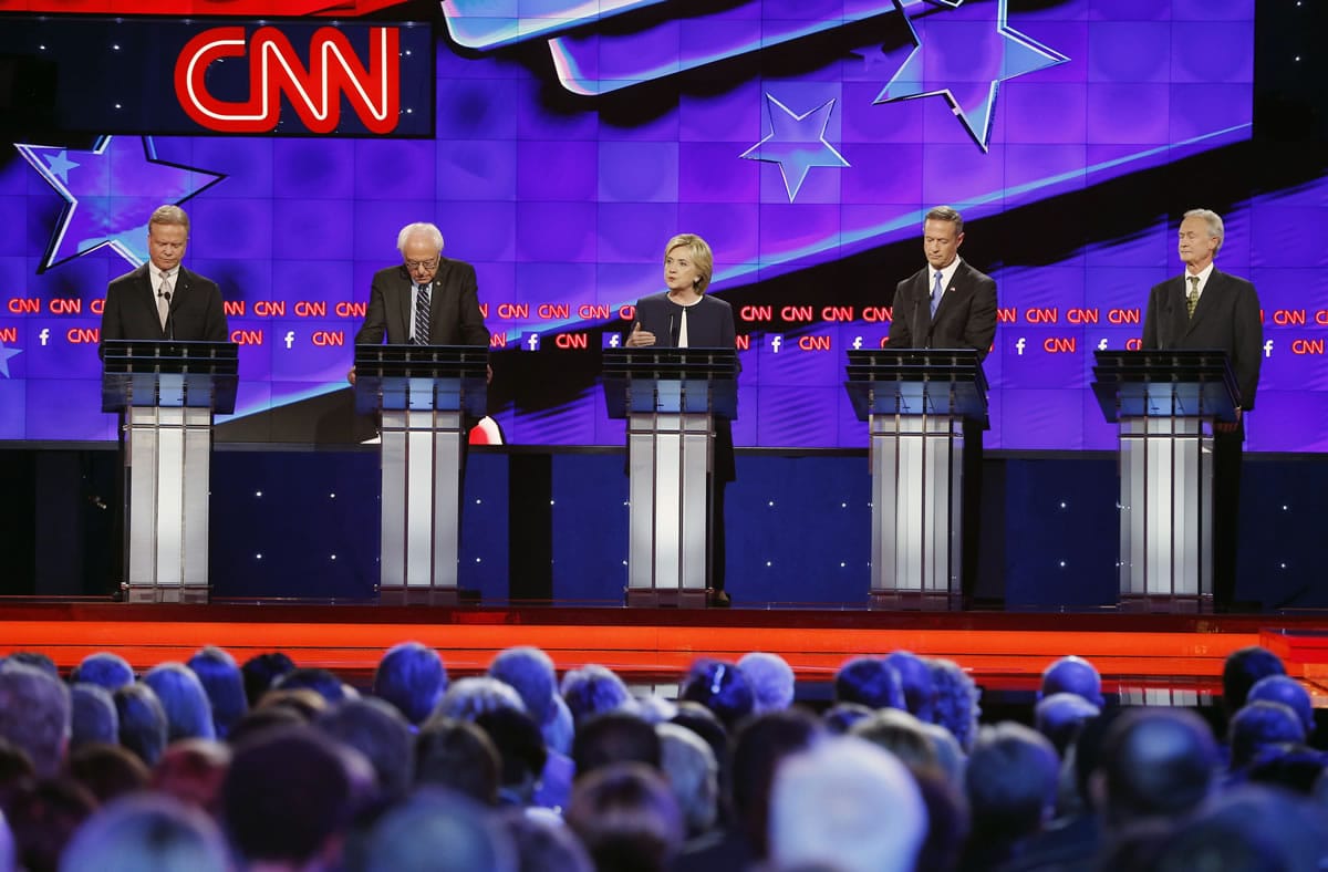 Democratic presidential candidates Jim Webb, from left, Sen. Bernie Sanders, Ind.-Vt., Hillary Rodham Clinton, Martin O&#039;Malley and Lincoln Chafee take the stage Tuesday in Las Vegas.
