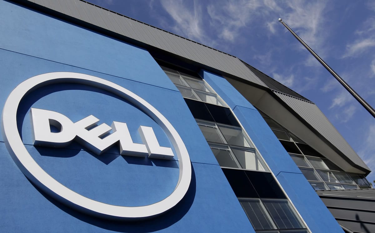 The sun is reflected in the exterior of Dell Inc.&#039;s offices in Santa Clara, Calif. Dell is buying data storage company EMC in a deal valued at approximately $67 billion, the companies announced, Monday. Michael Dell will serve as chairman and CEO of the combined business.
