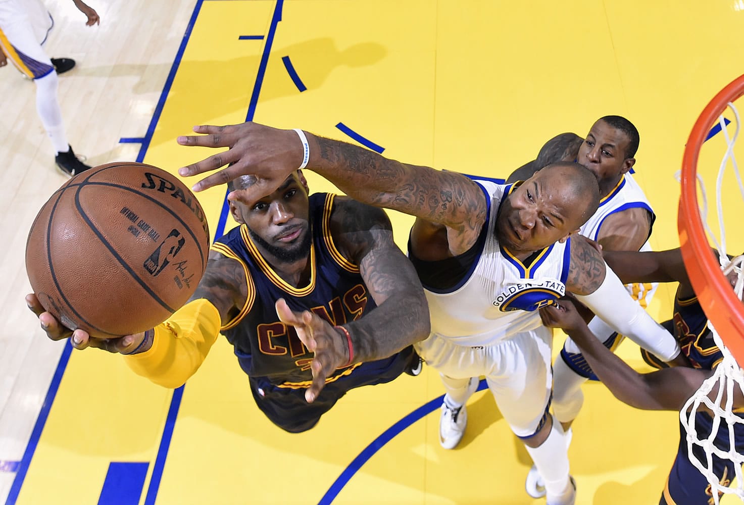 Cleveland Cavaliers forward LeBron James, left, shoots against Golden State Warriors forward Marreese Speights during Game 2 of the NBA Finals on June 7 in Oakland, Calif. There are several options for sports fans without cable to watch live games.