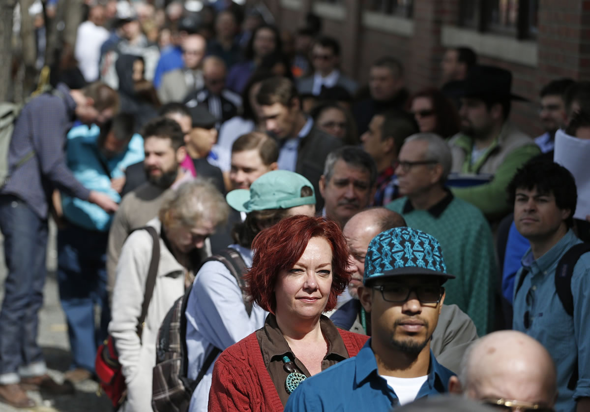 Job seekers line up to attend a marijuana industry job fair March 13 in downtown Denver.