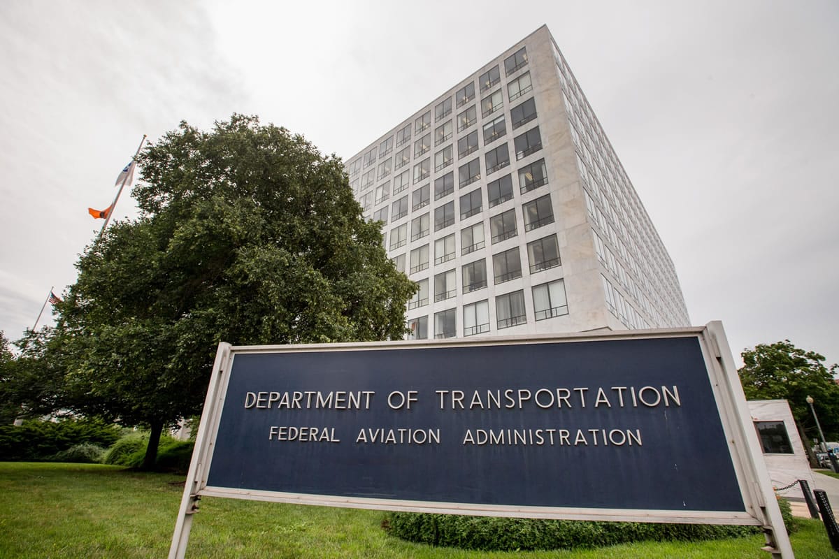 The Transportation Department&#039;s Federal Aviation Administration  building in Washington. The FAA proposed a record $1.9 million fine Tuesday against an aerial photography company for flying drones in crowded New York and Chicago airspace without permission.