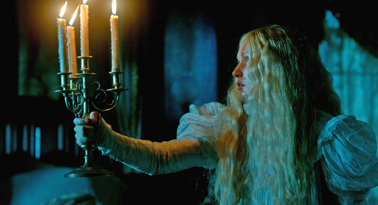 Mia Wasikowska plays Edith Cushing in a scene from "Crimson Peak," a gothic romance from director, Guillermo del Toro.