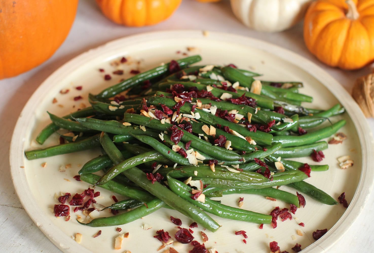 Cranberries and nuts liven up green beans for the holidays.