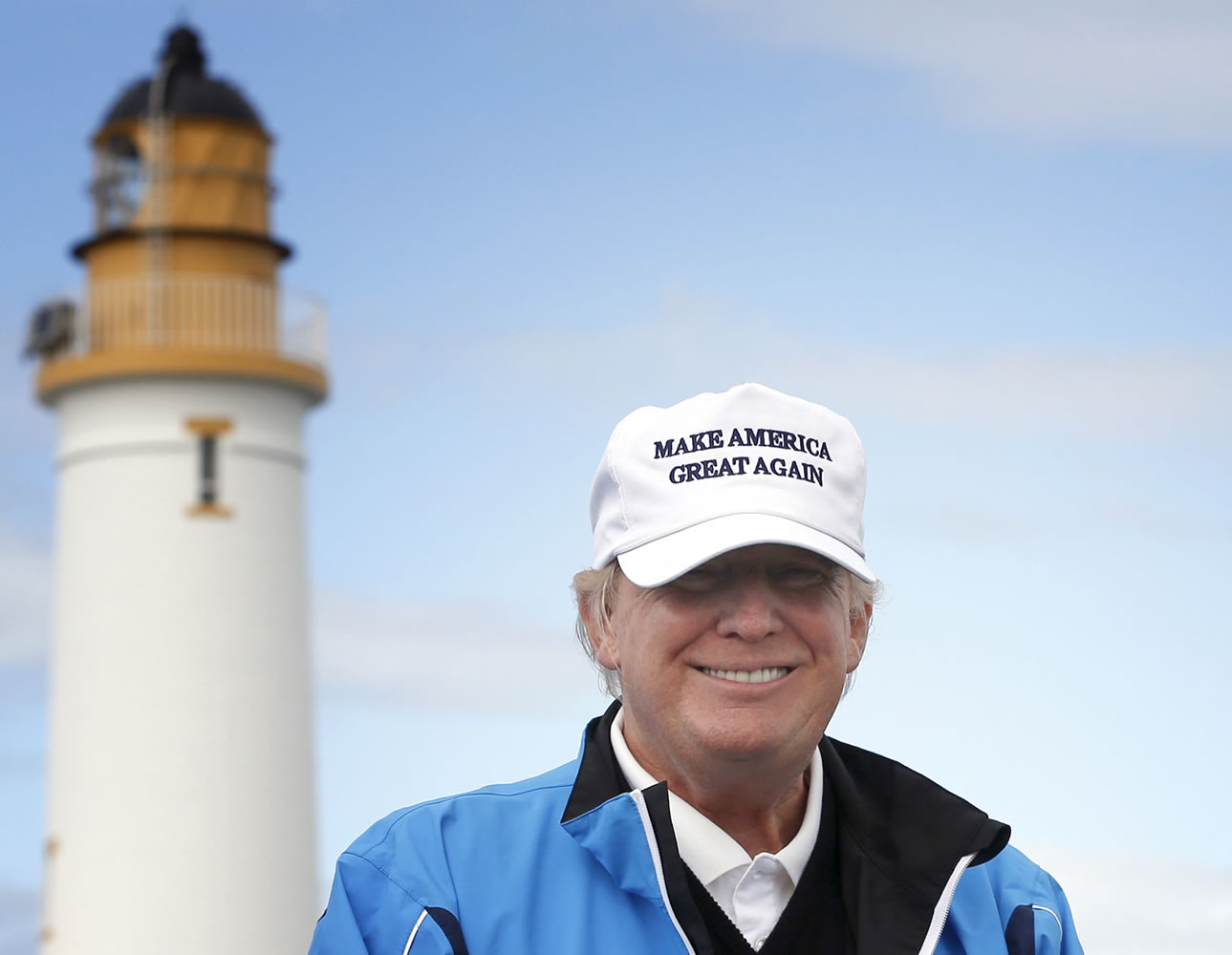 Republican presidential candidate Donald Trump poses for the media during the third day of the Women&#039;s British Open golf championship on Trump&#039;s Turnberry golf course in Turnberry, Scotland, in August.