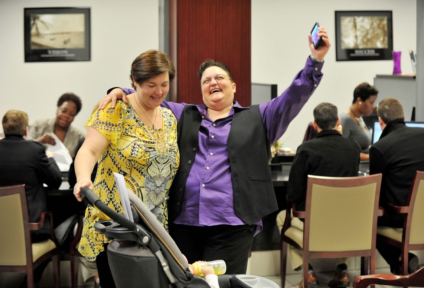 BOB SELF/Associated Press
Tami Voisard, right, celebrates with her fianc?e, Tara Day, after the couple were one of the first wave of same-sex couples to receive their marriage license Tuesday morning in the Duval County Courthouse in Jacksonville, Fla.