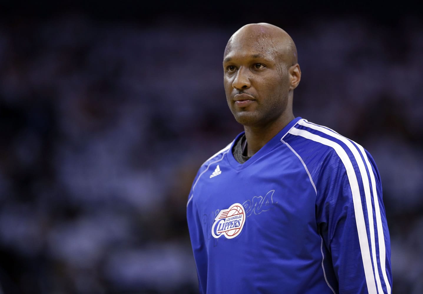 Los Angeles Clippers&#039; Lamar Odom (7) in action against the Golden State Warriors during an NBA basketball game in Oakland, Calif., in 2013. Authorities say former NBA and reality TV star Odom has been hospitalized after he was found unconscious at a Nevada brothel.