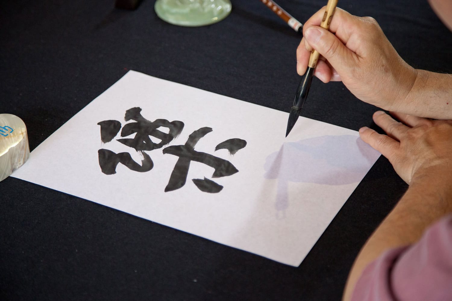 A traditional calligraphy demonstration will be part of the free admission at the Lan Su Chinese Garden in Portland.