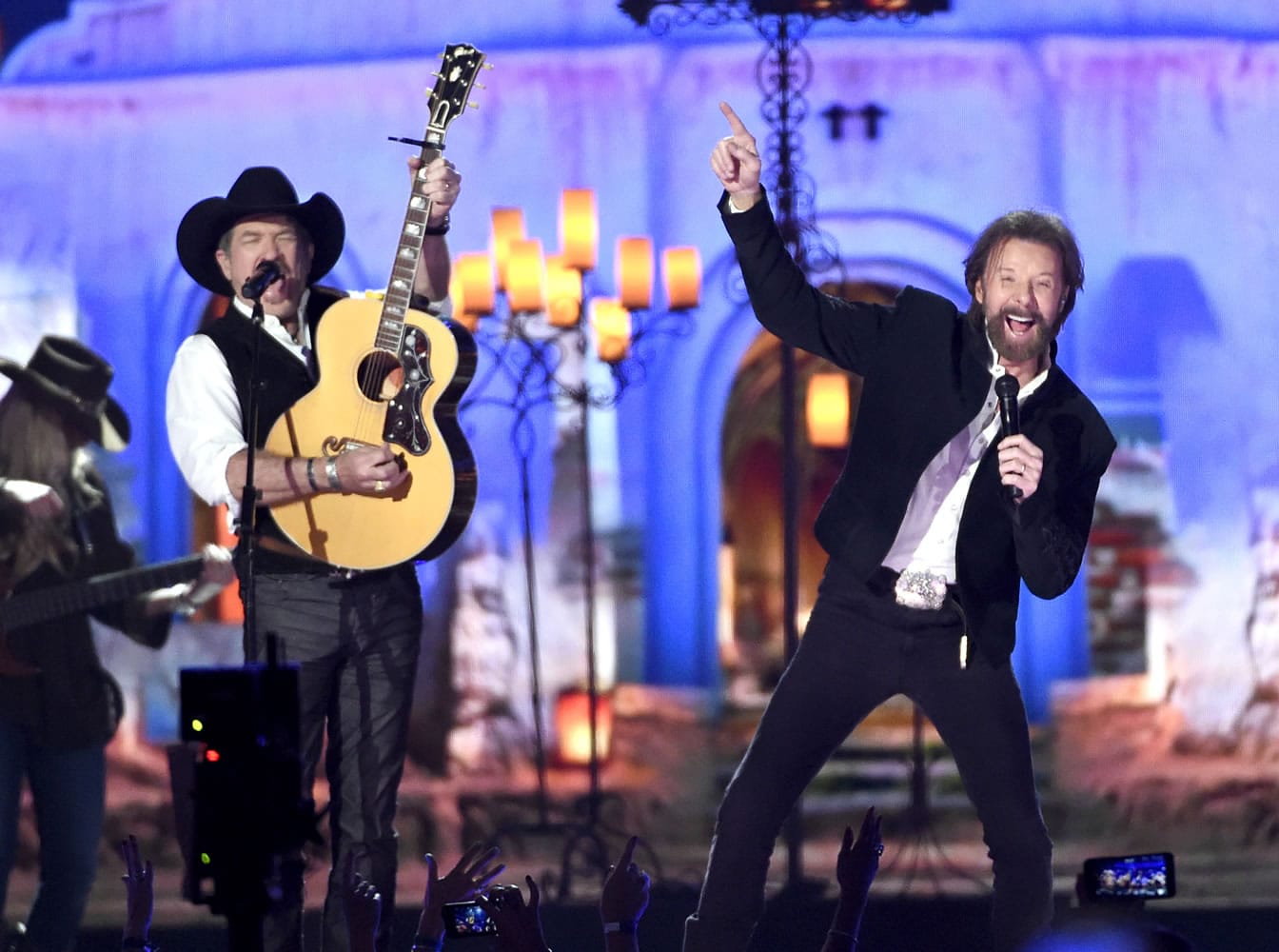 Kix Brooks, left, and Ronnie Dunn of Brooks &amp; Dunn are headed back to the Country Music Association Awards stage for the first time in seven years. The duo and Reba McEntire last performed on the awards show in 2008.
