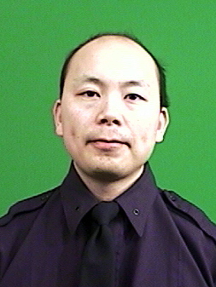 Wenjian Liu, one of two NYPD officers fatally shot in patrol car two weeks ago.