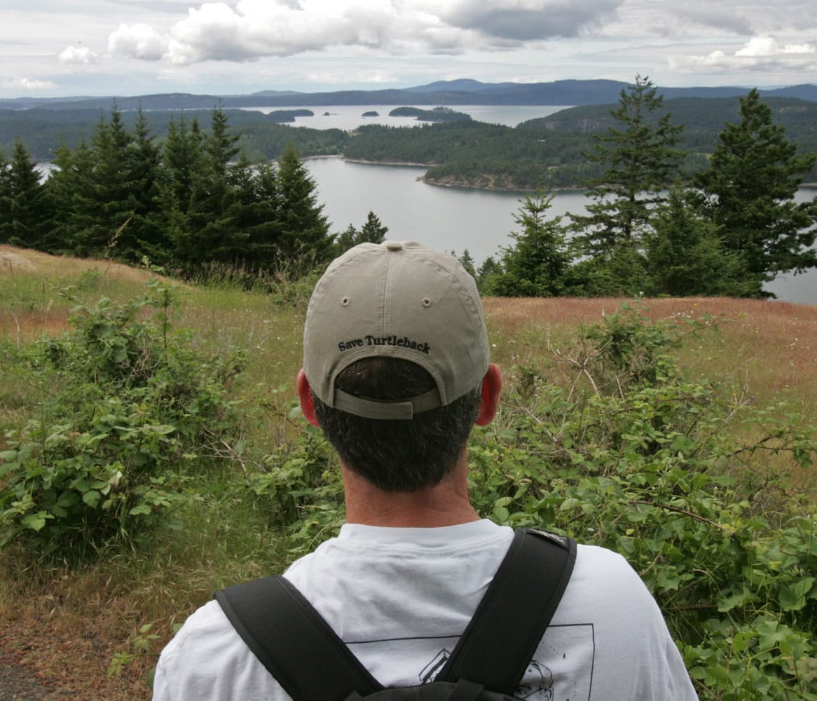 Hikers find water and island views aplenty from trails to the top of Turtleback Mountain, a natural preserve, seen in a June 14, 2007, photo in Washington. On Turtleback Mountain, you can hike in relative solitude.