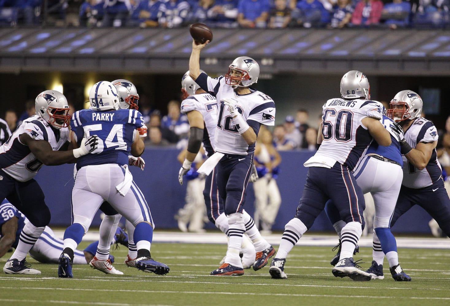 New England Patriots quarterback Tom Brady throws in the second half of an NFL football game against the Indianapolis Colts in Indianapolis, Sunday, Oct. 18, 2015.