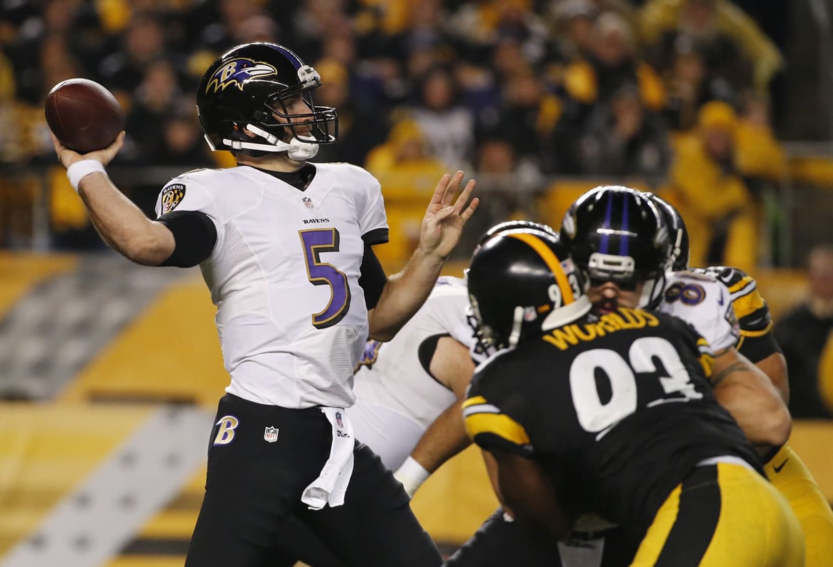Baltimore Ravens quarterback Joe Flacco (5) passes in the second quarter of an NFL wildcard playoff game against the Pittsburgh Steelers, Saturday, Jan. 3, 2015, in Pittsburgh. (AP Photo/Gene J.