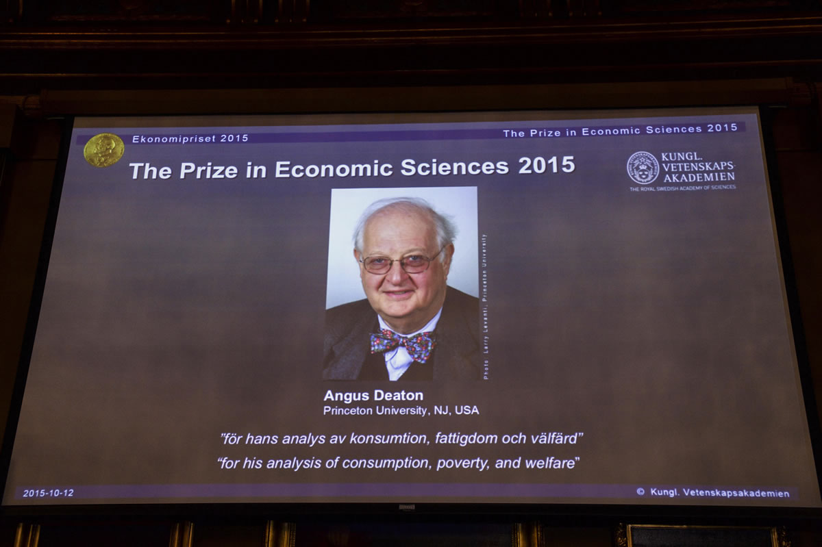 A view of the screen showing an image of Professor Angus Deaton, winner of the 2015 Sveriges Riksbank Prize in Economic Sciences in Memory of Alfred Nobel, as the Permanent Secretary for the Royal Swedish Academy of Sciences addresses a press conference to announce the winner of the prize, at the Royal Swedish Academy of Science, in Stockholm, Sweden, on Monday. Scottish economist Angus Deaton has won the Nobel memorial prize in economic sciences for &quot;his analysis of consumption, poverty, and welfare,&quot; the Royal Swedish Academy of Sciences said Monday.