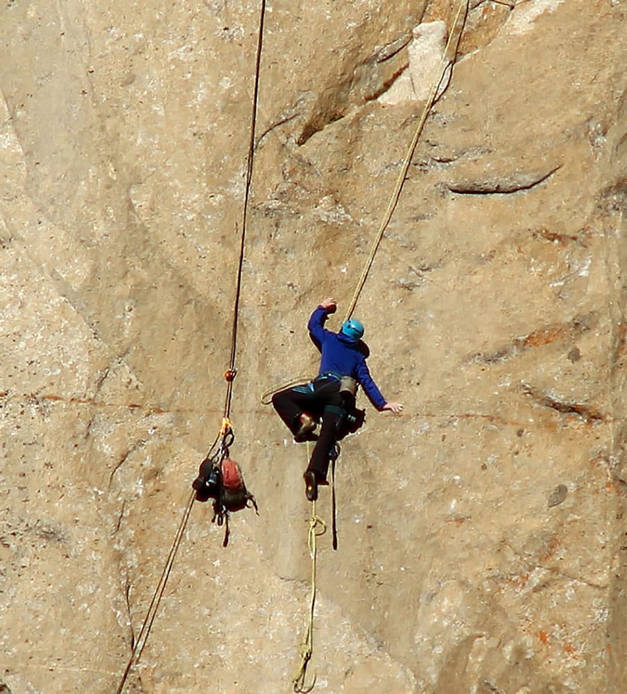 Kevin Jorgeson ascends what is known as Pitch 8 as two men attempt Dec.