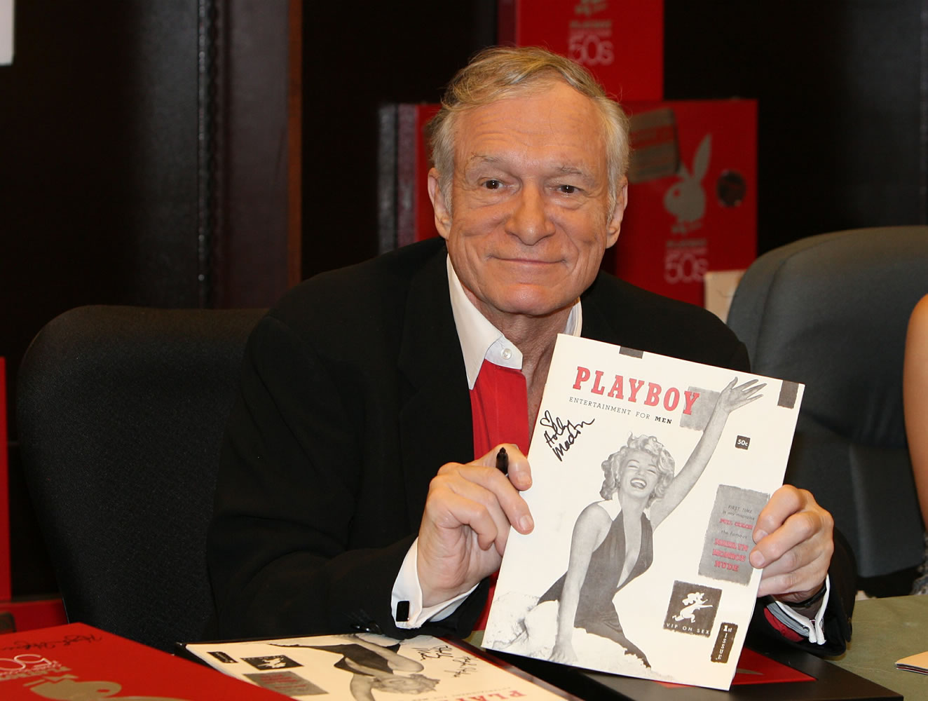 Playboy to stop running pictures of completely naked women pic