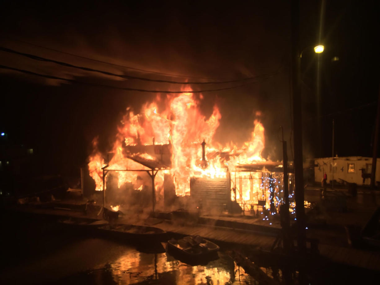 A fire tore through a two-story building at the Felida Moorage &amp; Marine Services, displacing the manager who resided in the building.
