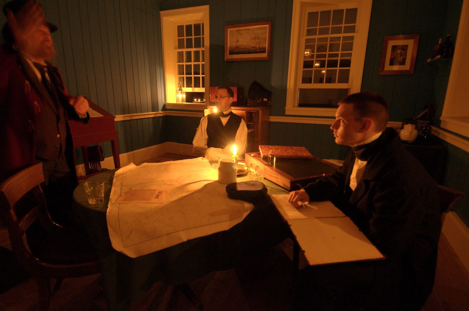 Actors portray life in the 1830s to 1850s through a series of vignettes during a Fort Vancouver lantern tour.