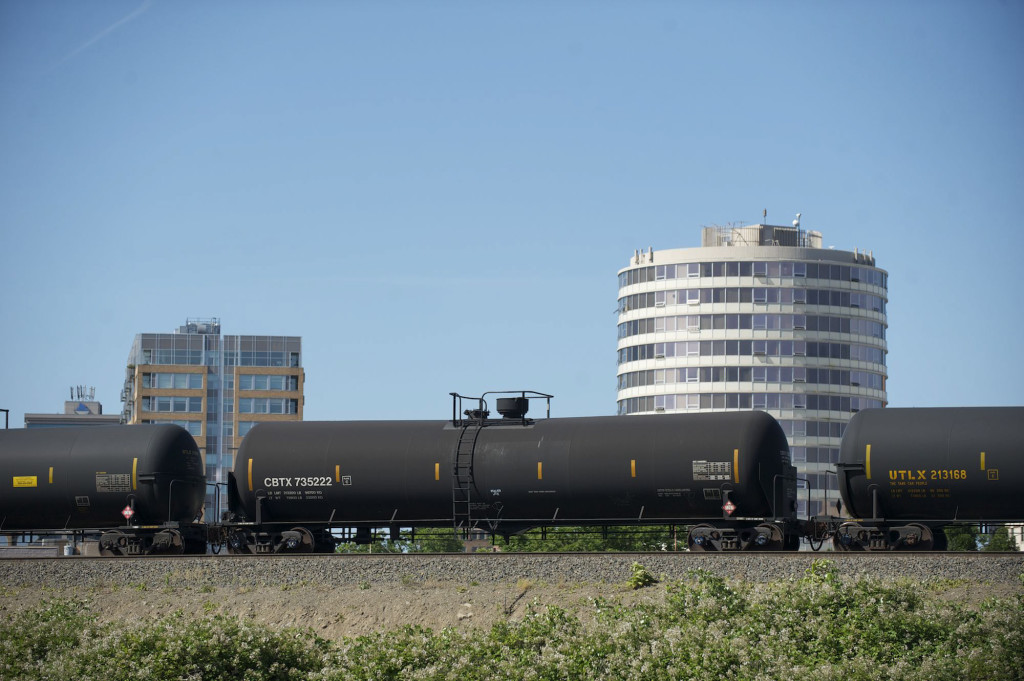 An oil train passes through downtown Vancouver.