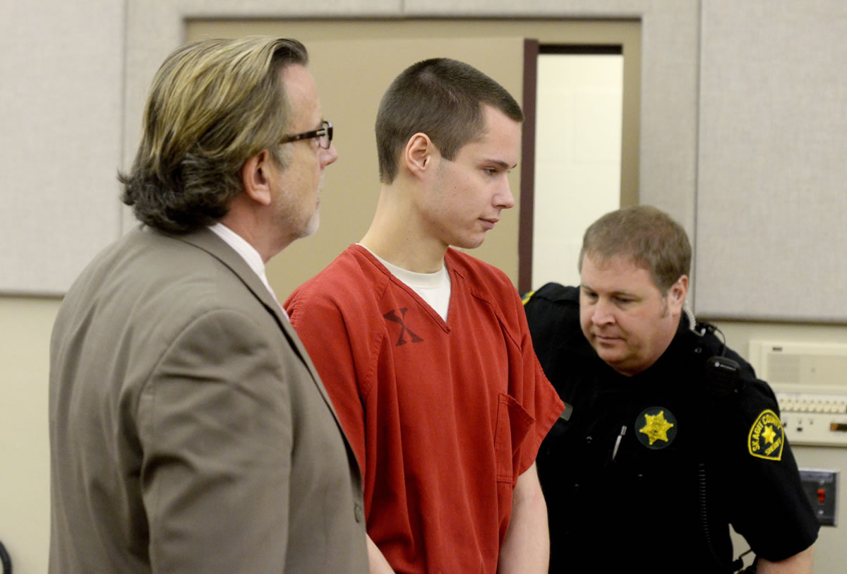 Colton Harris-Moore arrives in Skagit County Superior Court in Mount Vernon, Wash., on Thursday, Feb. 28, 2013, with his defense lawyer John Henry Browne.  Harris-Moore faces arraignment on a new second-degree burglary charge for the February 2010 break-in at the Anacortes airport where he stole a plane. Prosecutor Richard Weyrich also wanted to charge Harris-Moore with the theft of the plane, but he already pleaded guilty to that on a charge from San Juan County where the plane landed. Harris-Moore has acknowledged dozens of crimes from Washington to the Bahamas where he was arrested in July 2010.