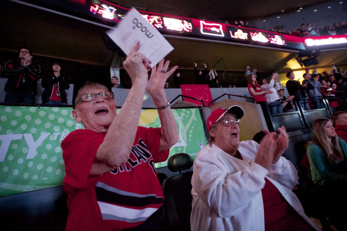 Lora Stoudt, 82, left, and Marge Gregg, 83, from VanMall Retirement, cheer on the Blazers at the Moda Center against the Spurs, Wednesday, February 19, 2014.