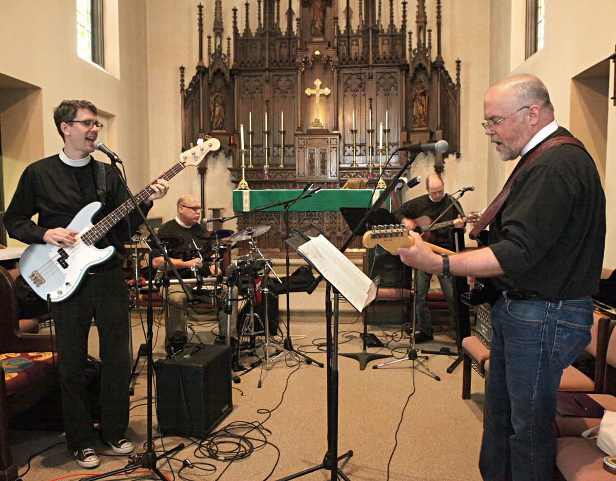 Members of the band Monstrance -- featuring the Rev. Drew Bunting, from left, the Rev. David Simmons, the Rev. Don Fleischman and the Rev. Andrew Jones -- rehearse in February at St.