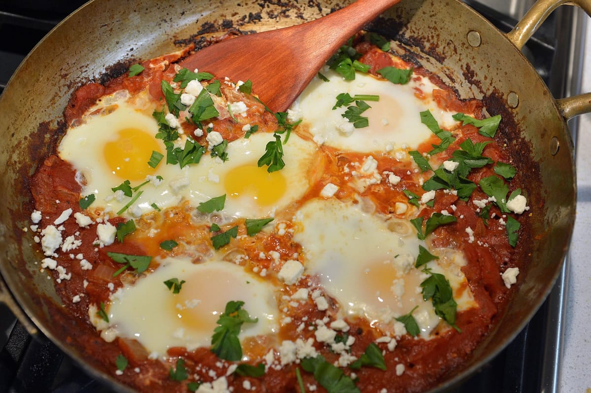 Shakshuka is a Middle Eastern breakfast dish of eggs poached in tomato sauce that's substantial enough for dinner.