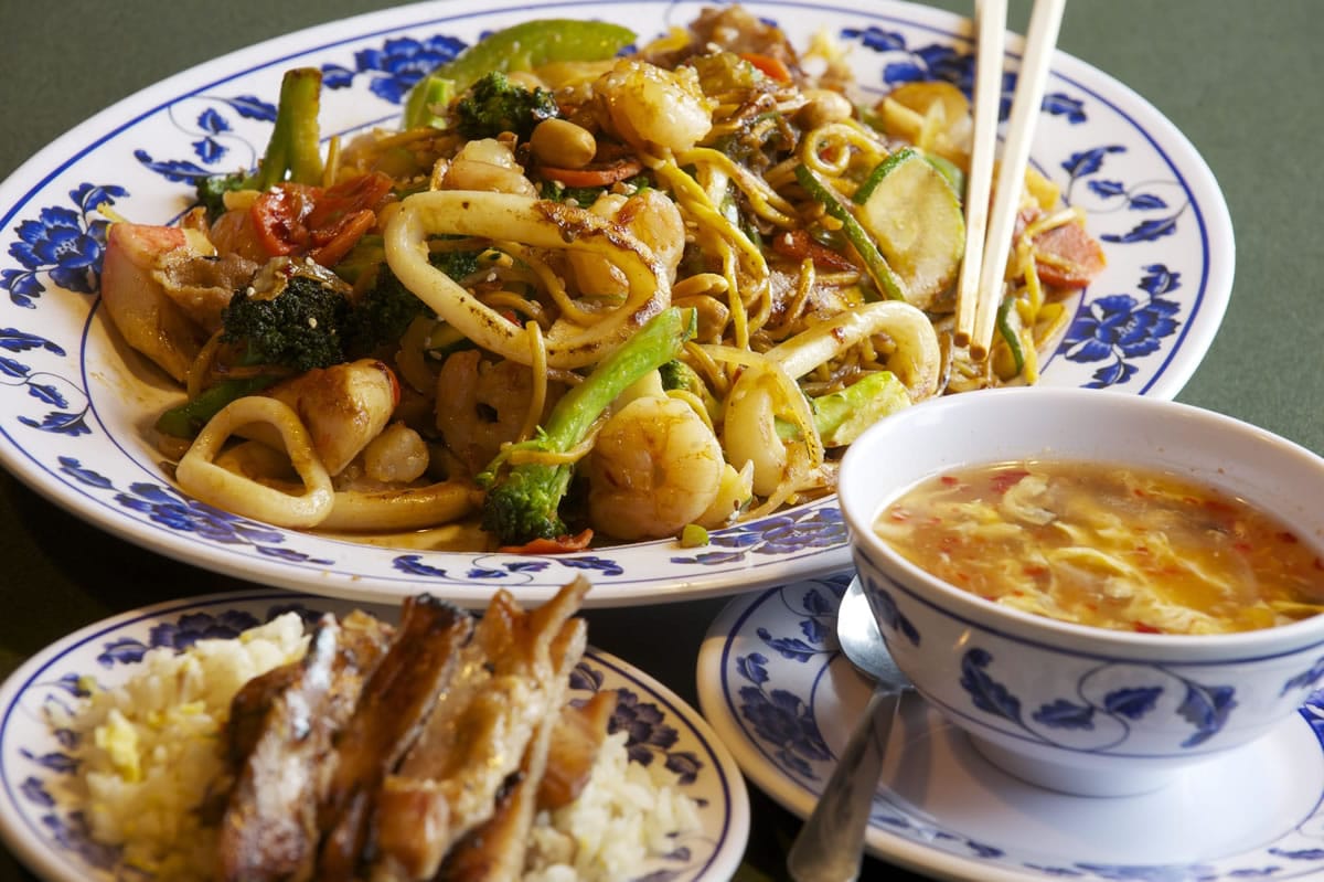 A custom creation at Yummy Mongolian Grill combines noodles, shrimp, calamari and pork with vegetables.