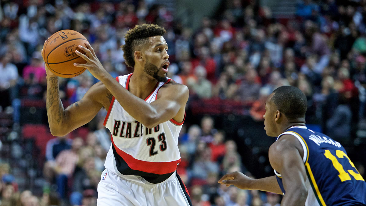 Portland&#039;s Allen Crabbe, left, does not attend the Blazers chapel service, but prefers an internet connection so he can see his family&#039;s service from Los Angeles.