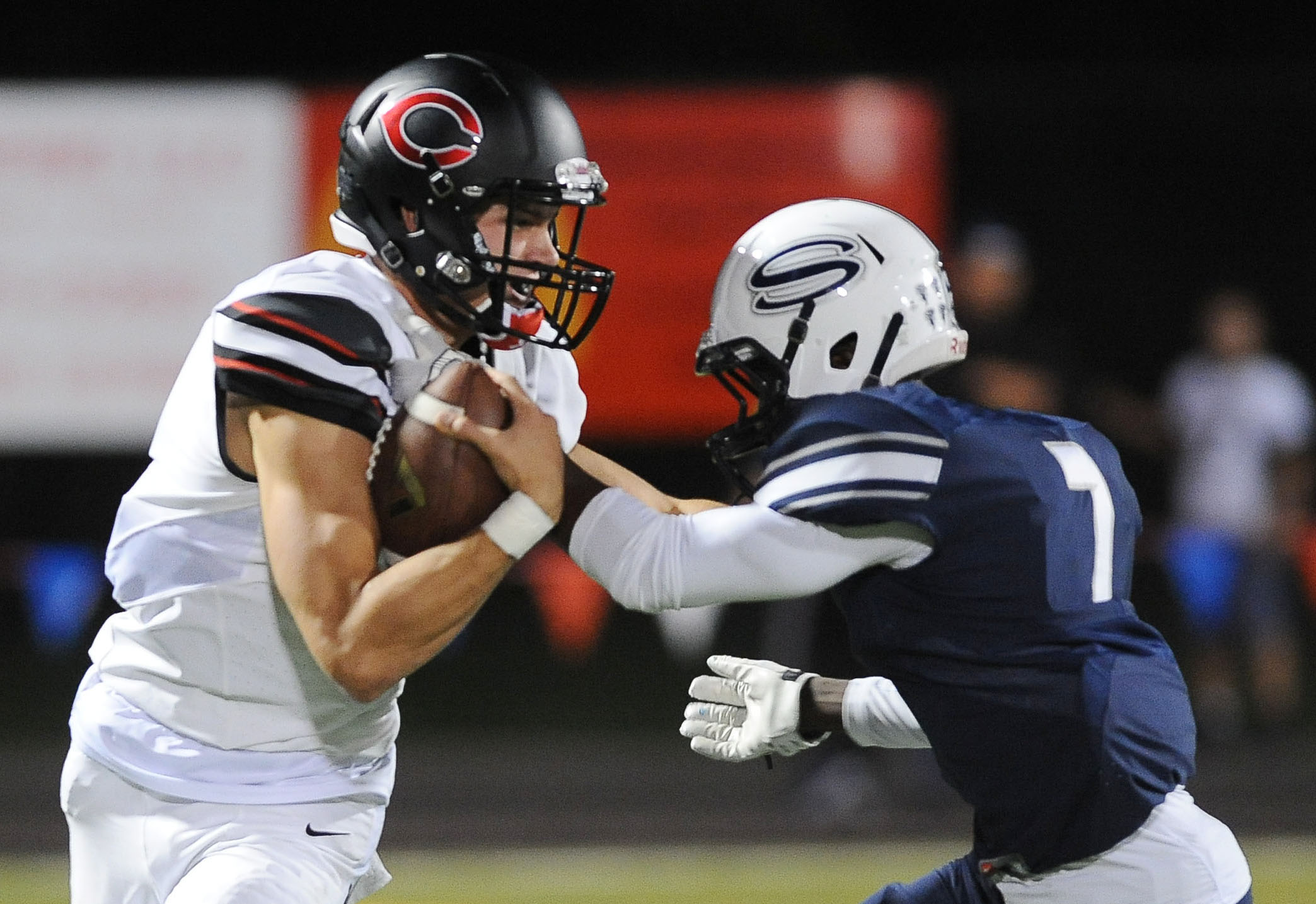 Camas player Laim Fitzgerald (L) is challenged by Skyview player Olive Emmy for the ball during the two team's first meeting in October.