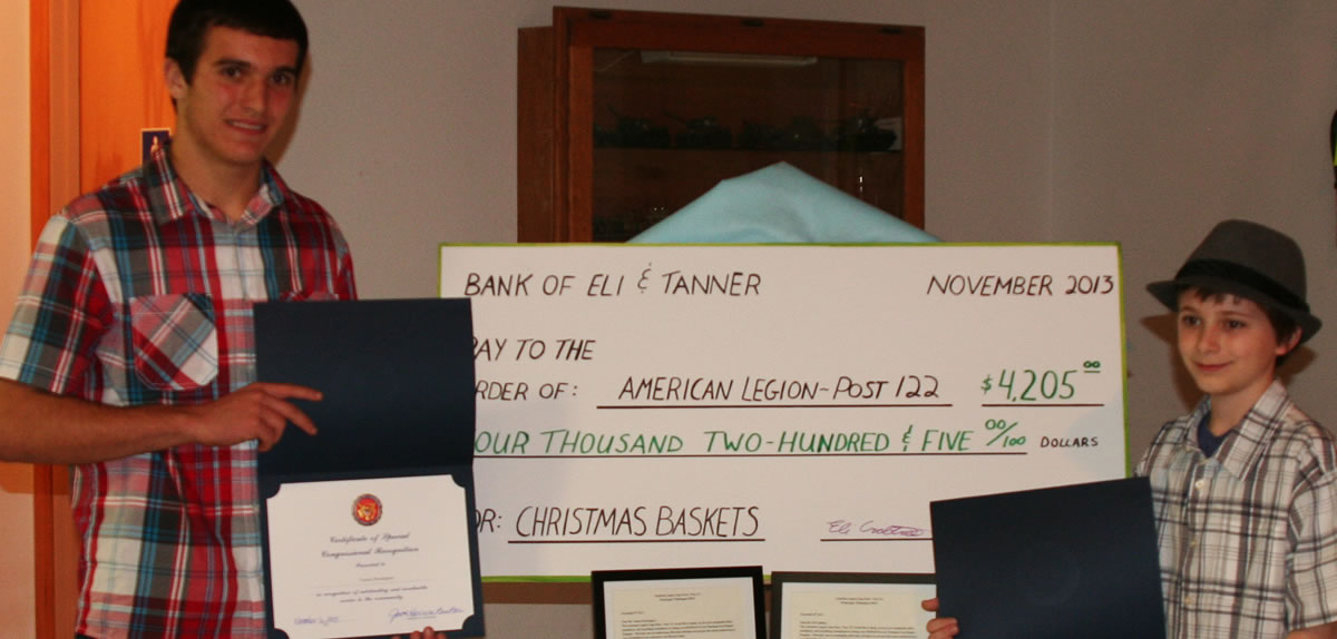 Tanner Howington (left) and Eli Crabtree (right) were honored by the American Legion Cape Horn Post 122 for their substantial donation to its holiday food basket program.