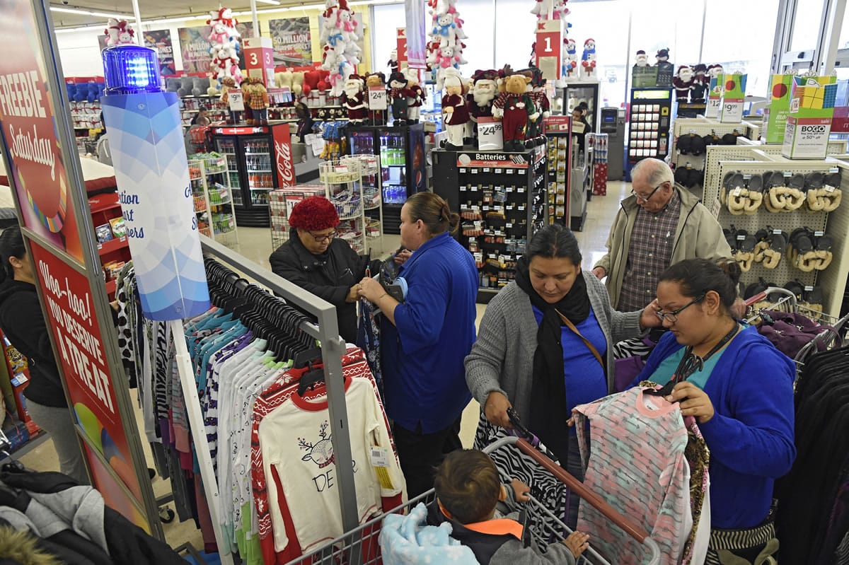 Kmart shoppers gather around the Blue Light Special at a store in northeast Philadelphia on Nov. 12.