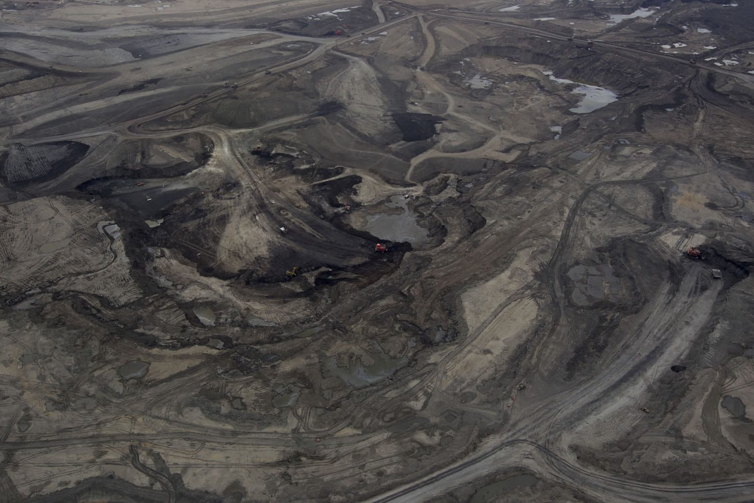 Oil is mined at a Syncrude Canada site near Fort McMurray, Alberta, Canada, in August.