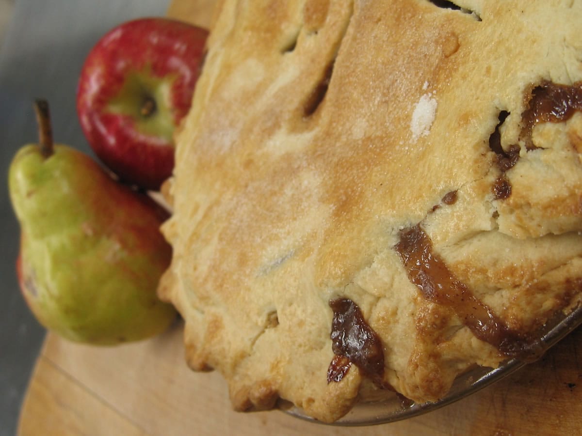 Put together tart apples and sweet pears and flavor with cinnamon and nutmeg for a seasonal pie.