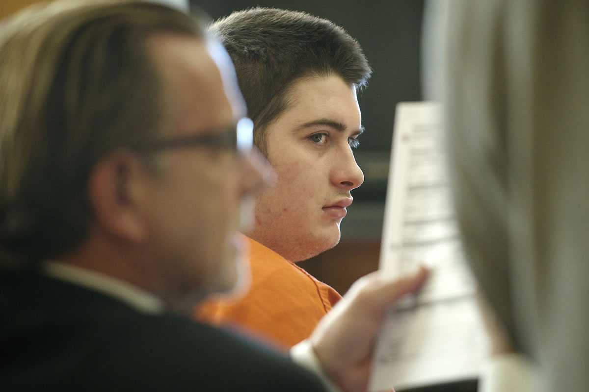 Matthew Starr watches as attorneys go over documents July 15, 2013 in Vancouver  in Judge Melnick's courtroom.