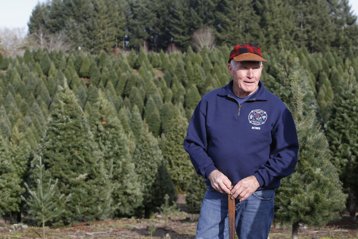 Neil Schill, owner of Glenwood Tree Farm, expects a good year for Christmas tree sales. Many of his customers make it a tradition.