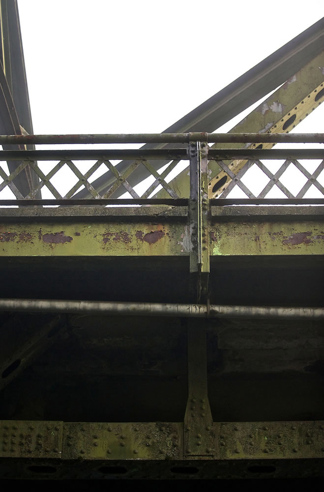 Two decades of weathering has left its mark on the North Fork Lewis Bridge.