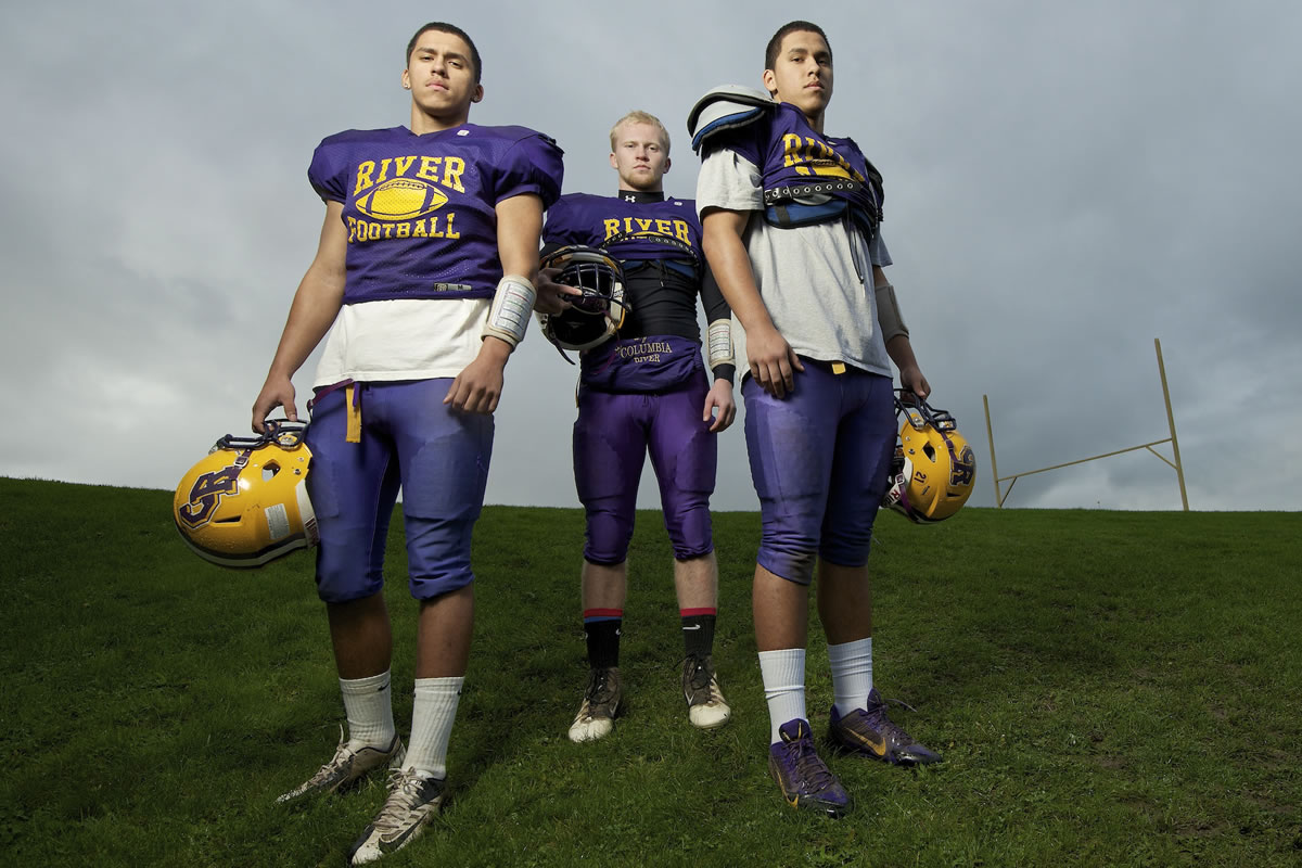 Jonathan Branson, left, Gabe Evenson, center, and Jayson Branson, right, photographed Thursday November 14, 2013 in Vancouver, Washington, are a big part of Columbia River's post football season playoff success.
