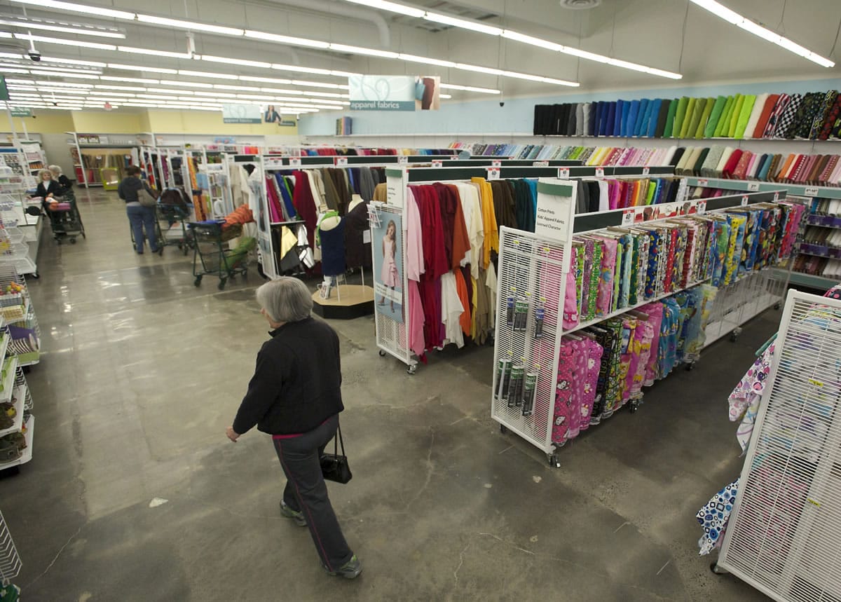 Rows of bright bolts of fabric greet shoppers in the new Jo-Ann Fabric and Craft Stores location in Hazel Dell.