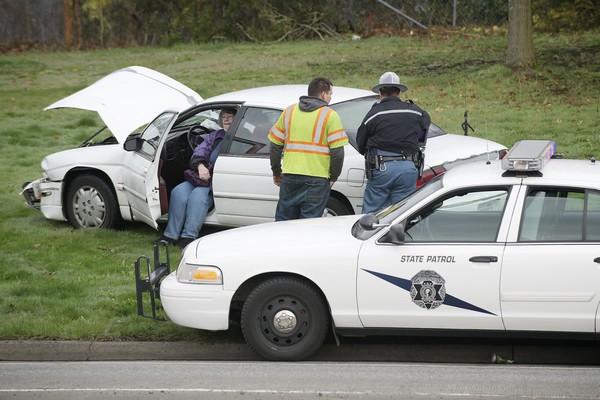 Washington State Patrol troopers investigate a traffic accident on the southbound offramp from I-5 to Mill Plain Boulevard on Tuesday.