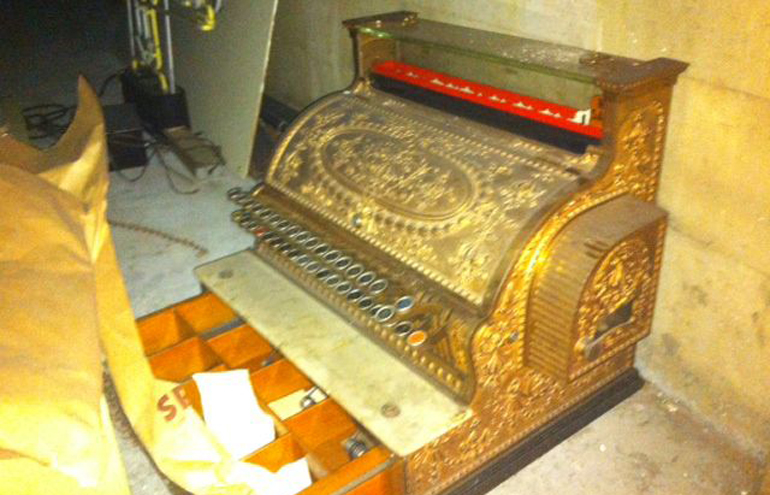 A century-old cash register recently was found stashed behind a wall panel at Sparks Home Furnishings.