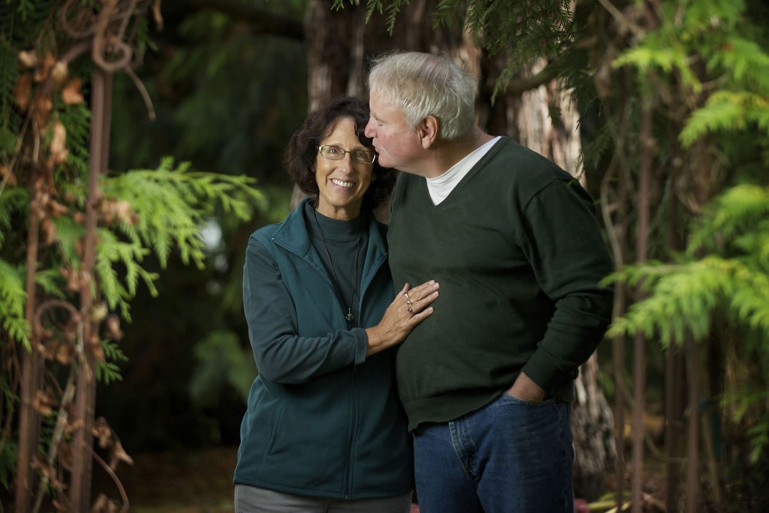 Paul and Susan Ward, outside their Meadow Glade home Friday, found on the state-based insurance exchange, Washington Healthplanfinder, a health plan with better coverage for less cost than their current plan.
