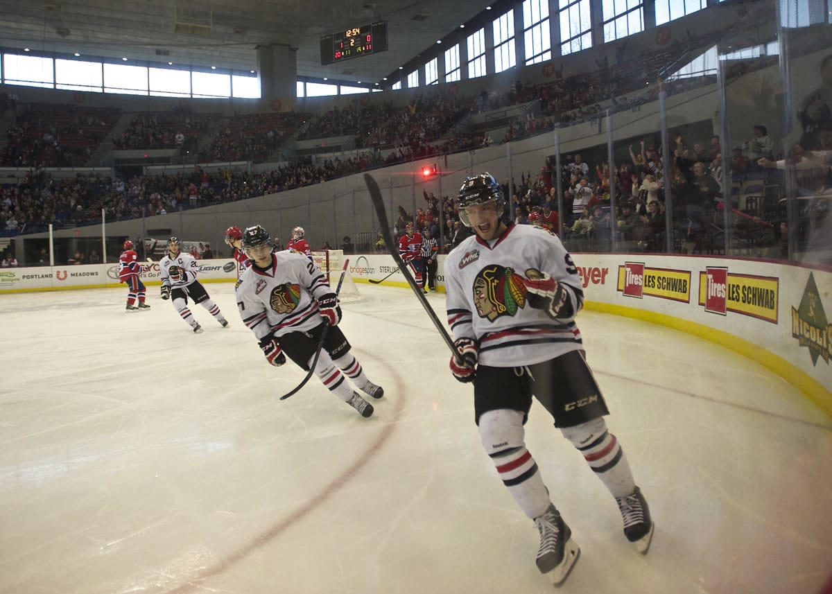 The Winterhawks' Chase De Leo pumps his fist after scoring against the Chiefs making it 2-0 in the second period at the Daylight Classic game at Memorial Coliseum on Sunday.