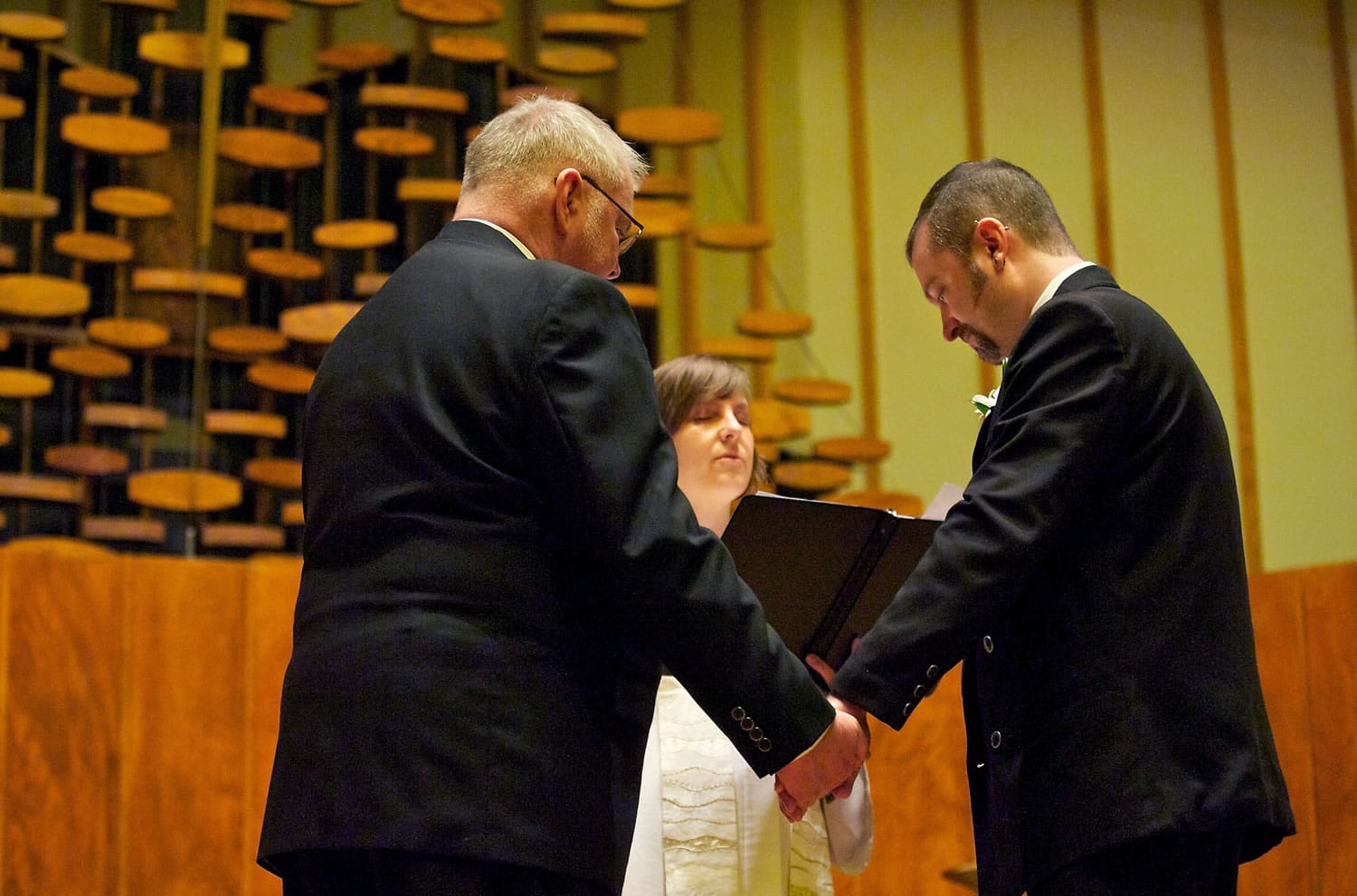 Portlanders and committed United Church of Christ members Jim McPartland, left, and Grant Edwards were wed on Nov. 9 at the First Congregational United Church of Christ in Hazel Dell. The Rev.