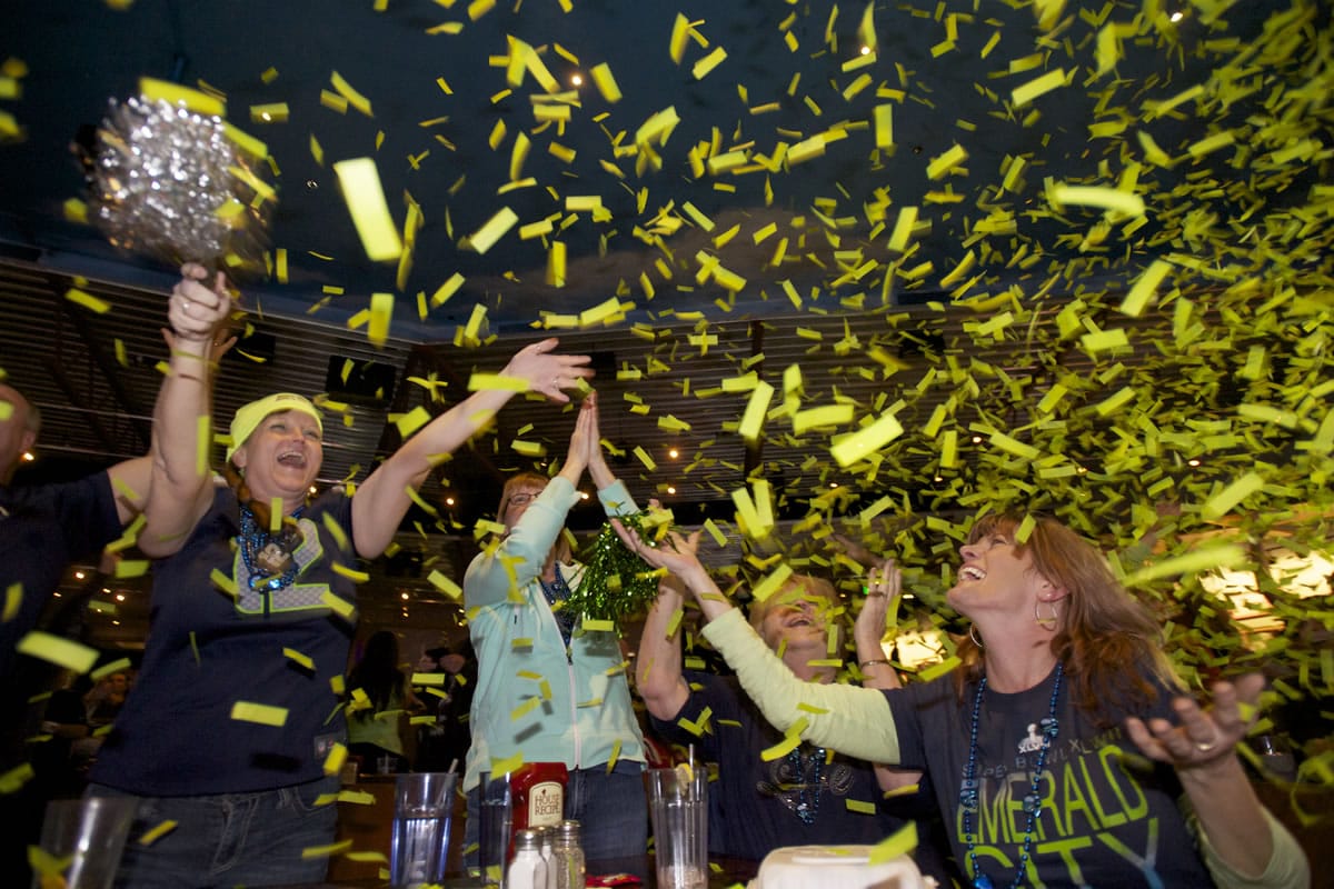 Seahawks fans celebrate at Big Al's at the end of Super Bowl XLVIII on Sunday.