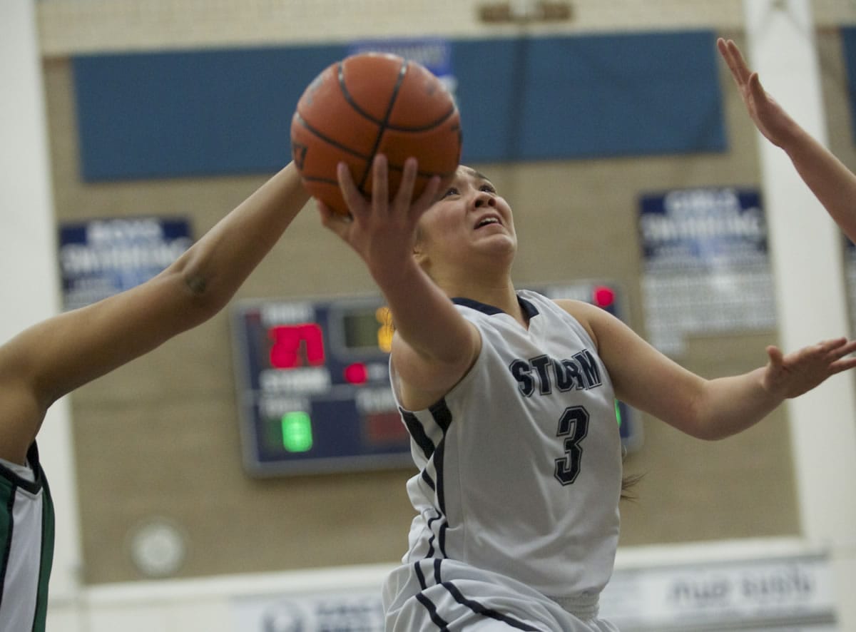 Skyview's Stephanie McDonagh (3) drives to the basket against Emerald Ridge in the 4A girls bi-district playoff game at Skyview High School on Thursday.