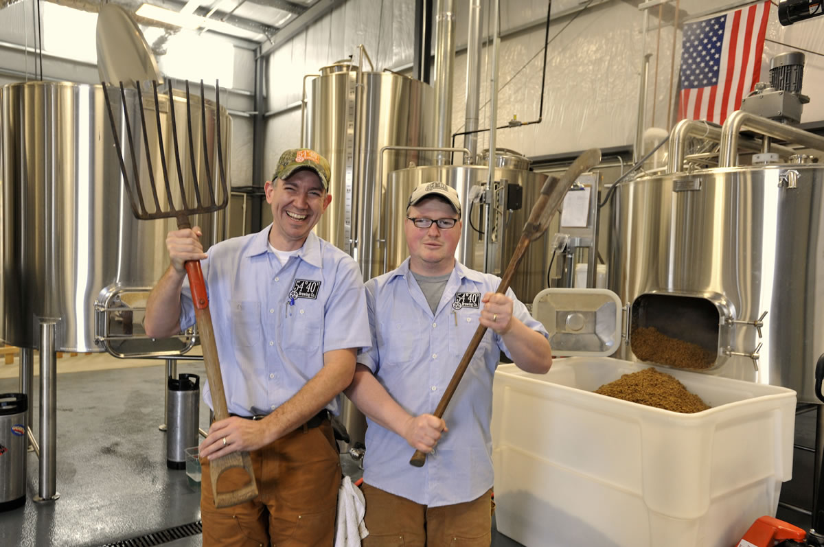 Bolt Minister, left, and Charlie Hutchins are co-owners of the 54°40' Brewing Co., which recently opened in Washougal. There are now 18 breweries in Clark County.