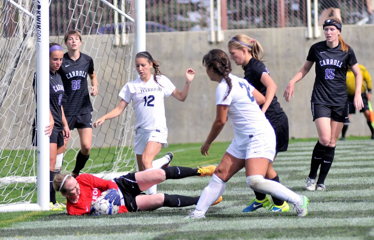 Carroll College goalkeeper Jamie Carter makes another stop.